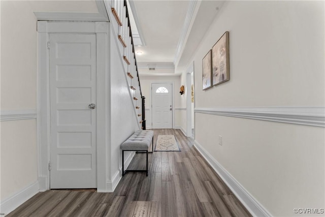 1216 N 30th St, Richmond, VA 23223 - foyer entrance with dark wood finished floors, stairs, and crown molding