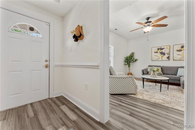 1216 N 30th St, Richmond, VA 23223 - foyer with wood finished floors, plenty of natural light, and a ceiling fan