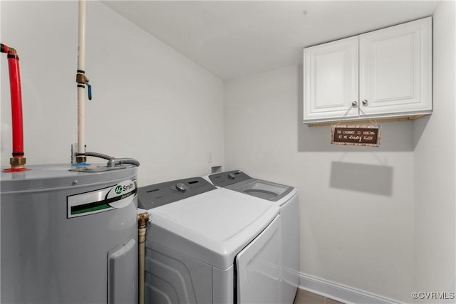 1216 N 30th St, Richmond, VA 23223 - laundry room with water heater, washing machine and clothes dryer, and cabinet space