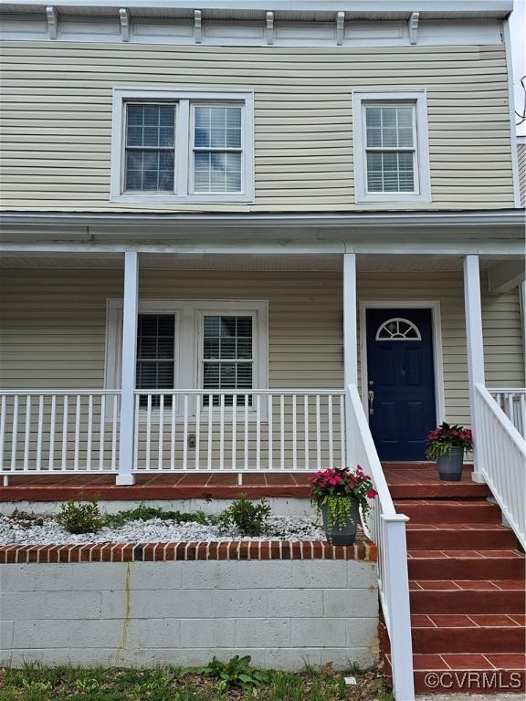 1216 N 30th St, Richmond, VA 23223 - view of front facade with a porch