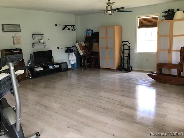 2577 Red Bank Rd, Ark, VA 23061 - living room featuring wood finished floors, ceiling fan, and baseboards