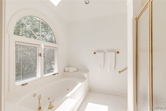 9905 Carrington Pl, Henrico, VA 23238 - bathroom with plenty of natural light, a whirlpool tub, tile patterned floors, and baseboards