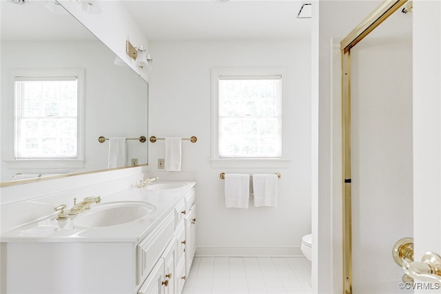 9905 Carrington Pl, Henrico, VA 23238 - full bathroom with toilet, tile patterned flooring, double vanity, and baseboards