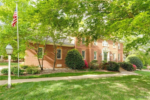 9905 Carrington Pl, Henrico, VA 23238 - view of front of property with a front lawn and brick siding