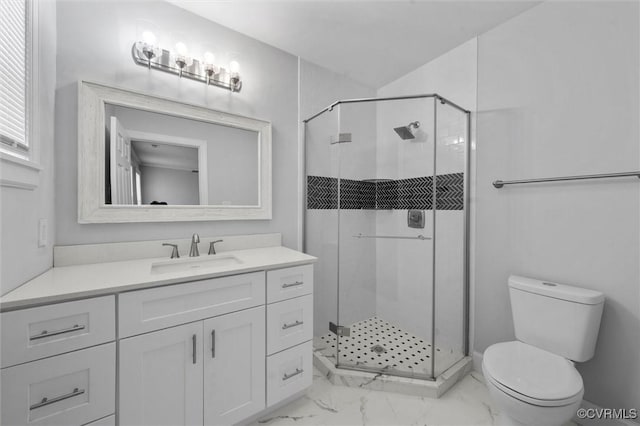 full bathroom with marble finish floors, toilet, a stall shower, and vanity