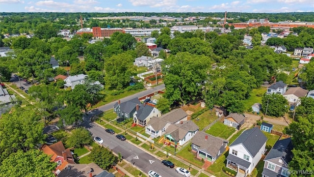 aerial view of property's location with nearby suburban area