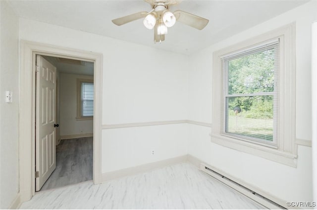 908 Rosemont Rd, Richmond, VA 23224 - empty room with baseboard heating and a ceiling fan