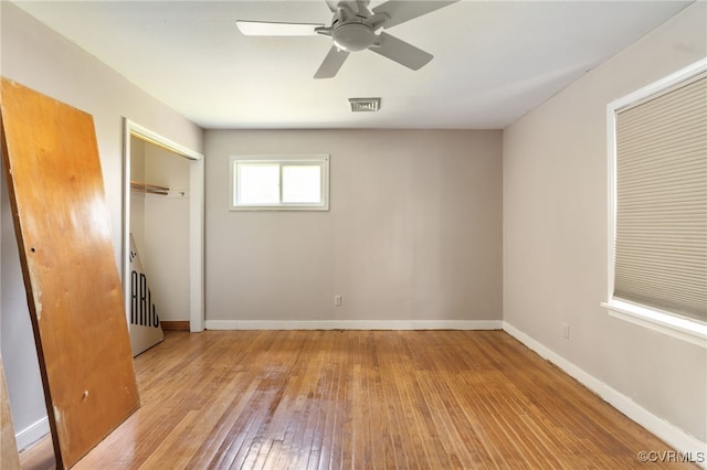 2004 Springdale Rd, Henrico, VA 23222 - unfurnished bedroom with hardwood / wood-style floors, baseboards, a closet, and ceiling fan