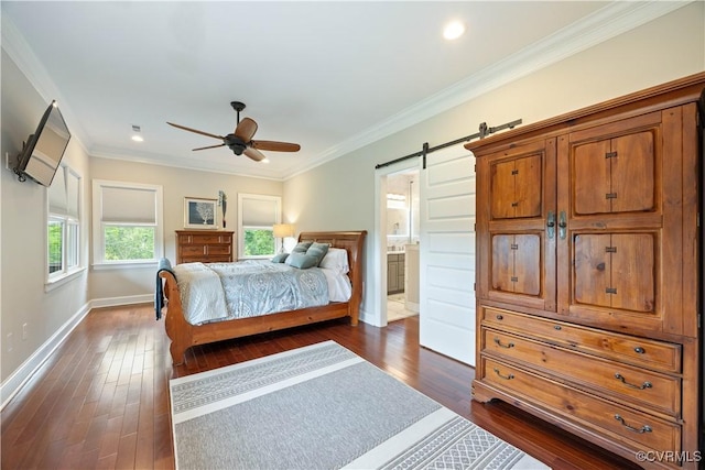 816 Riverside Park, Richmond, VA 23220 - bedroom with baseboards, crown molding, dark wood-type flooring, a barn door, and connected bathroom