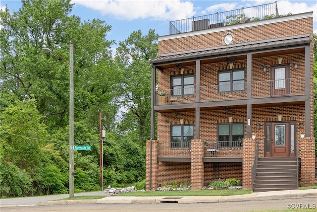 816 Riverside Park, Richmond, VA 23220 - view of front of property with a balcony, brick siding, and a standing seam roof