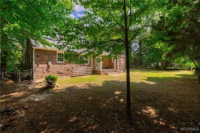 view of yard with fence