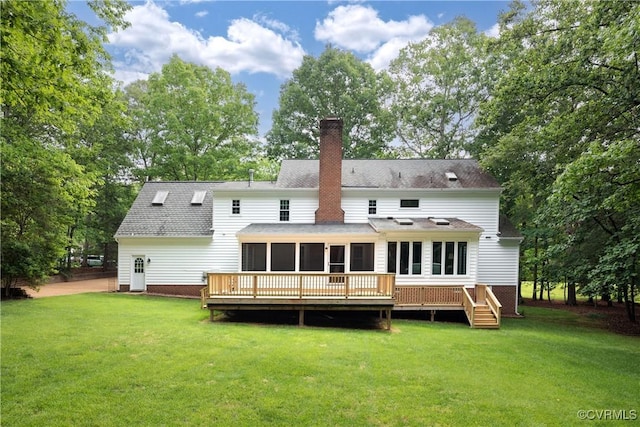 10910 Lesser Scaup Lndg, Chesterfield, VA 23838 - rear view of house with a chimney, a sunroom, a yard, and a deck