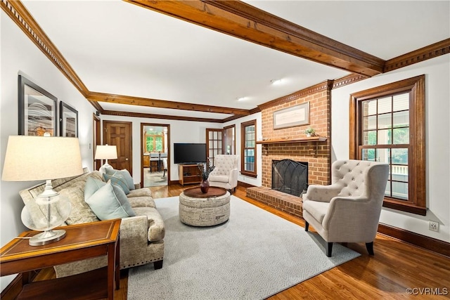 10910 Lesser Scaup Lndg, Chesterfield, VA 23838 - living area featuring beam ceiling, wood finished floors, a brick fireplace, plenty of natural light, and ornamental molding