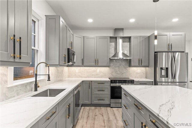 2809 Bethlehem Rd, Henrico, VA 23228 - kitchen with stainless steel appliances, wall chimney range hood, a sink, gray cabinetry, and light stone counters