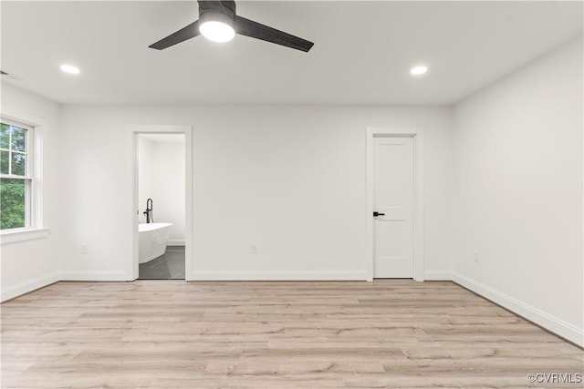 2809 Bethlehem Rd, Henrico, VA 23228 - unfurnished bedroom with light wood-type flooring, recessed lighting, baseboards, and connected bathroom