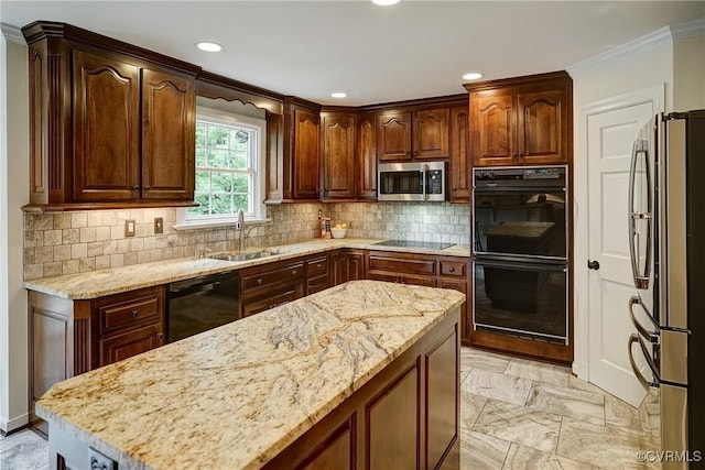 kitchen featuring black appliances, a sink, crown molding, light stone countertops, and recessed lighting