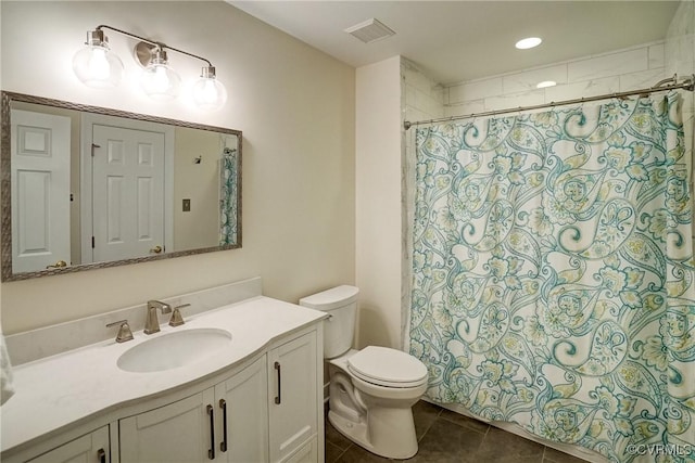 bathroom with toilet, tile patterned flooring, vanity, and a shower with shower curtain