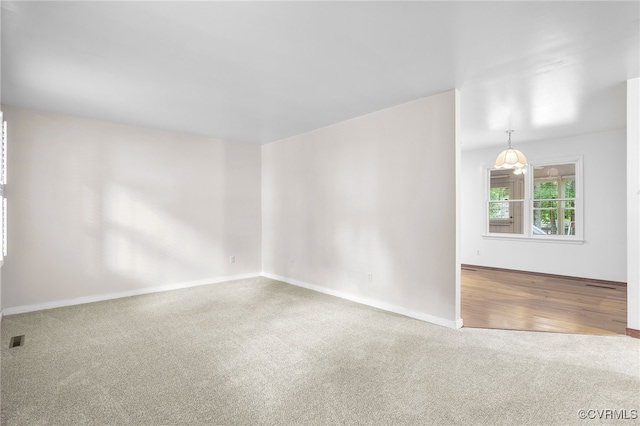 1013 Mill Forest Dr, Midlothian, VA 23113 - carpeted empty room with baseboards