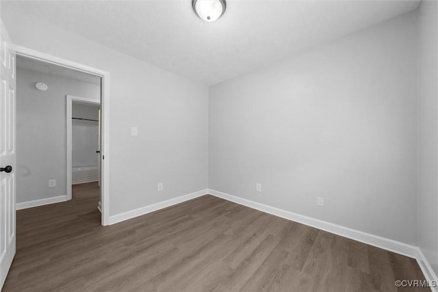 7408 Newbys Ct, Chesterfield, VA 23832 - unfurnished bedroom with wood finished floors and baseboards