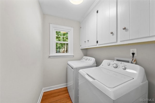 2430 Olde Stone Rd, Midlothian, VA 23113 - washroom with cabinet space, washer and dryer, baseboards, and wood finished floors