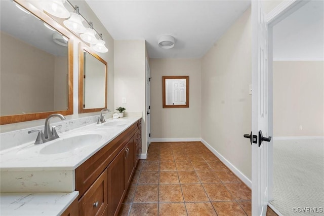 2430 Olde Stone Rd, Midlothian, VA 23113 - bathroom featuring baseboards and double vanity