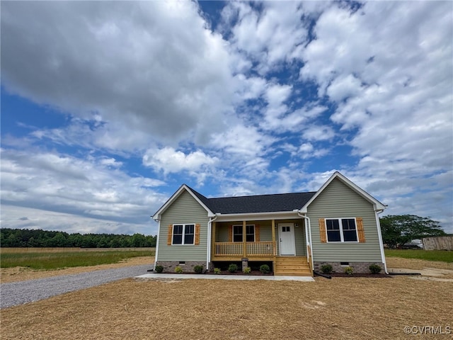 14057 Robinson Rd, Stony Creek, VA 23882 - ranch-style house with crawl space, a porch, roof with shingles, and gravel driveway