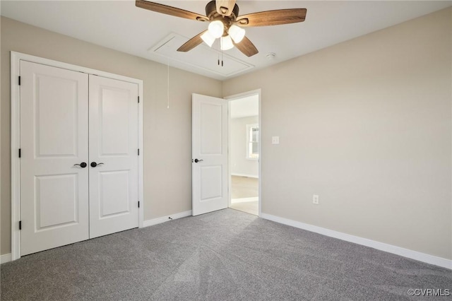 14057 Robinson Rd, Stony Creek, VA 23882 - unfurnished bedroom with attic access, carpet floors, baseboards, and a closet