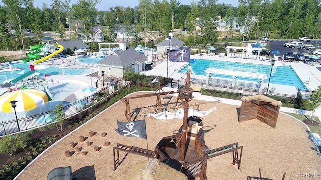 18740 Palisades Cove Trl, Moseley, VA 23120 - drone / aerial view of a pool area and a tree filled landscape