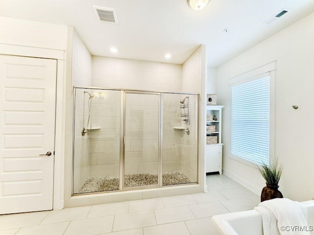5112 Old Main St, Henrico, VA 23231 - bathroom featuring a stall shower, baseboards, tile patterned flooring, and a tub