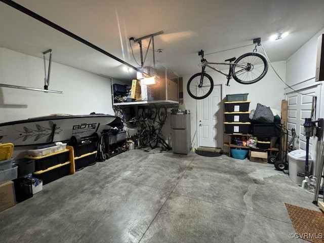 5112 Old Main St, Henrico, VA 23231 - garage with a workshop area and fridge
