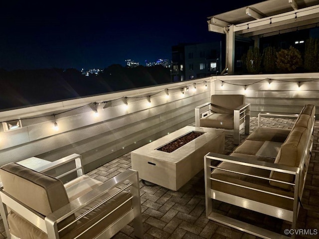 5112 Old Main St, Henrico, VA 23231 - patio at night with a fire pit and area for grilling