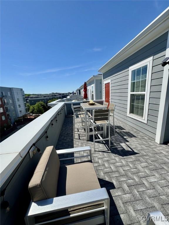 5112 Old Main St, Henrico, VA 23231 - view of patio featuring outdoor dining space and a balcony