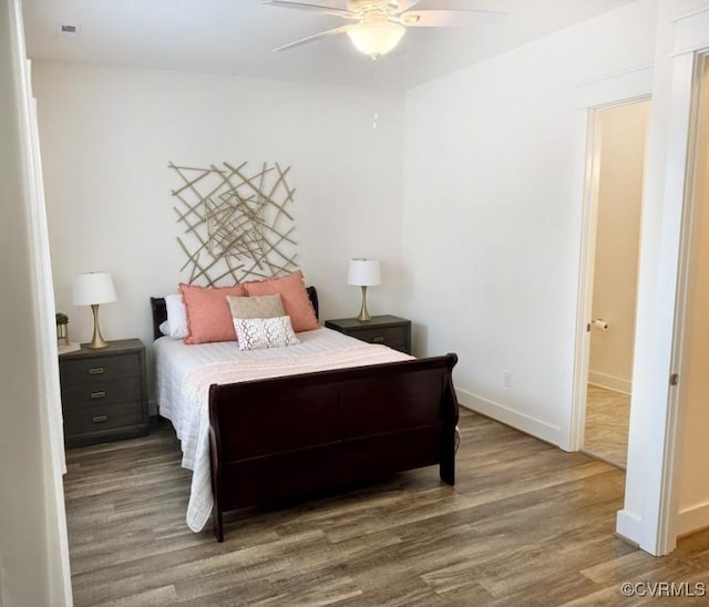 5112 Old Main St, Henrico, VA 23231 - bedroom with wood finished floors, baseboards, and a ceiling fan