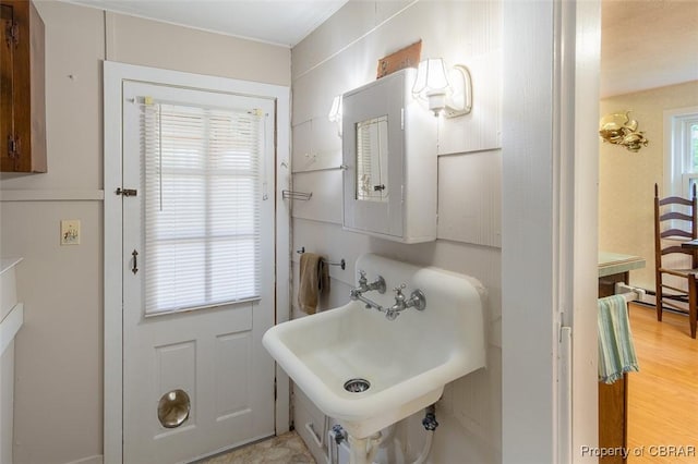 60 Edwards Landing Rd, Gwynn, VA 23066 - bathroom featuring a sink and a baseboard radiator