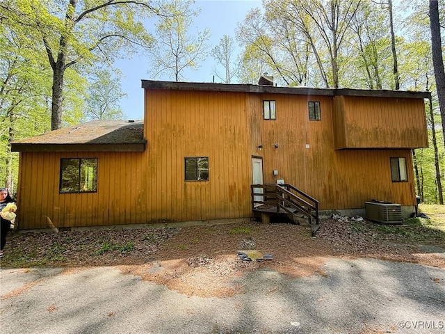 view of property exterior with central air condition unit