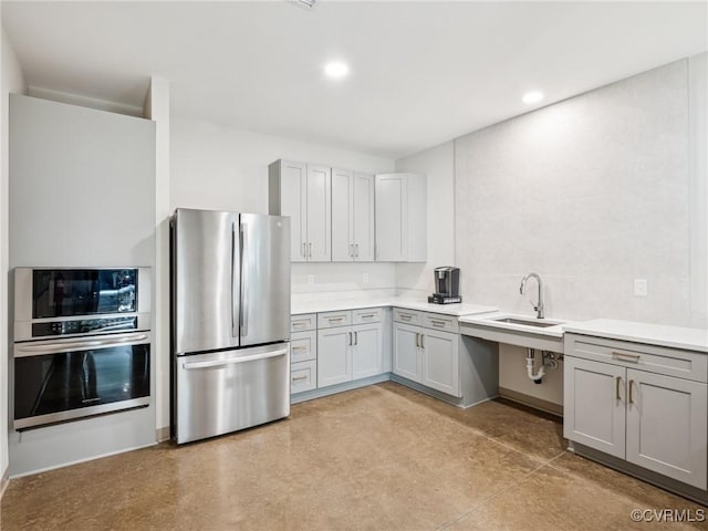 6016 Banyan Ln, Chesterfield, VA 23234 - kitchen with stainless steel appliances, gray cabinets, light countertops, recessed lighting, and finished concrete floors