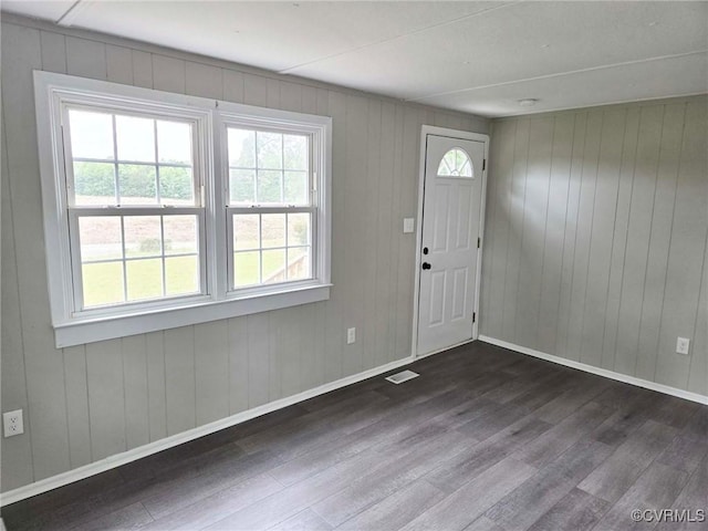11400 Weyanoke Rd, Charles City, VA 23030 - foyer featuring dark wood-style flooring and wooden walls