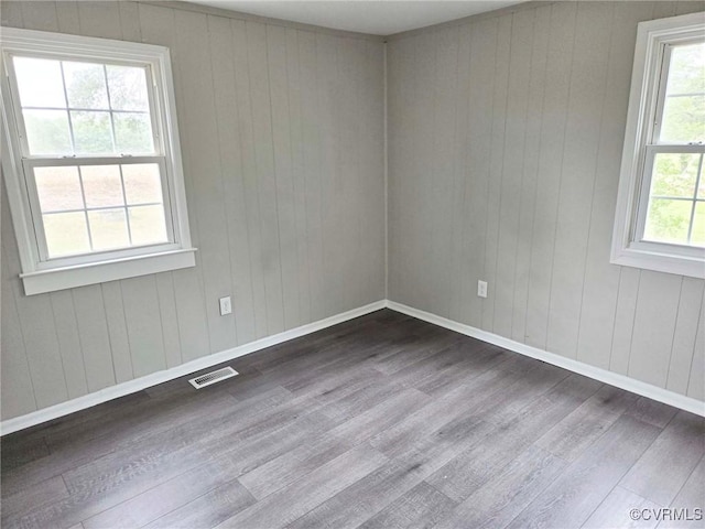 11400 Weyanoke Rd, Charles City, VA 23030 - unfurnished room featuring dark wood finished floors and wooden walls