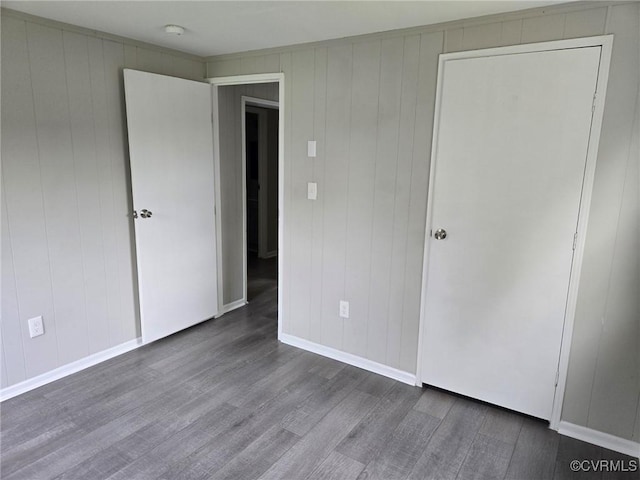 11400 Weyanoke Rd, Charles City, VA 23030 - unfurnished bedroom with dark wood finished floors and baseboards