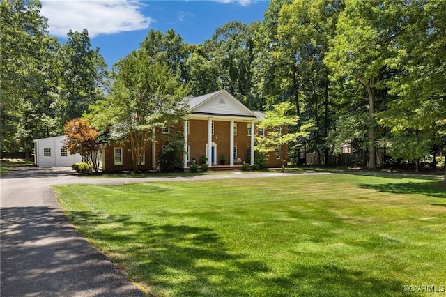 13951 Whitechapel Rd, Midlothian, VA 23113 - greek revival house with a front yard and asphalt driveway