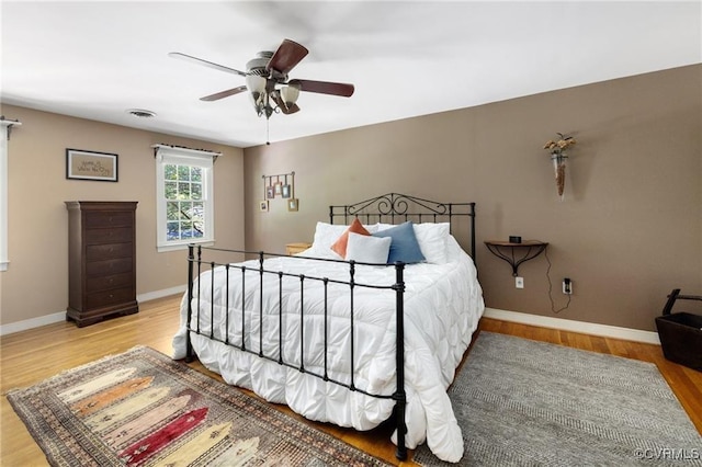 13951 Whitechapel Rd, Midlothian, VA 23113 - bedroom featuring wood finished floors, baseboards, and a ceiling fan