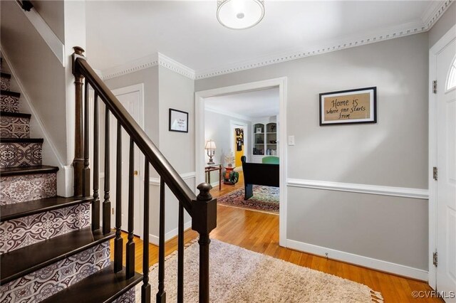 13951 Whitechapel Rd, Midlothian, VA 23113 - stairway featuring wood finished floors, ornamental molding, and baseboards