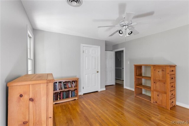 13951 Whitechapel Rd, Midlothian, VA 23113 - bedroom featuring wood finished floors, baseboards, and ceiling fan