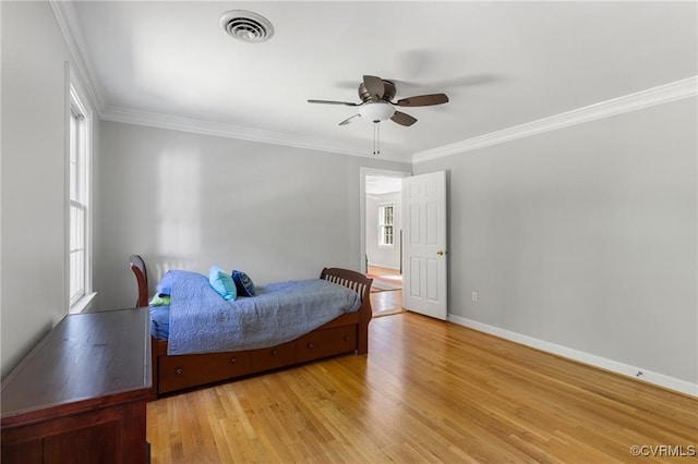 13951 Whitechapel Rd, Midlothian, VA 23113 - bedroom featuring crown molding, light wood-style flooring, baseboards, and a ceiling fan