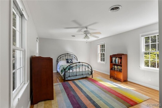 13951 Whitechapel Rd, Midlothian, VA 23113 - bedroom featuring baseboards, wood finished floors, and a ceiling fan