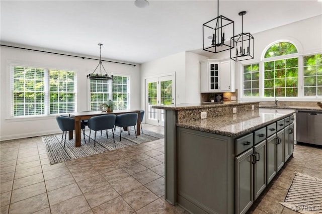 16400 Orchard Tavern Pl, Moseley, VA 23120 - kitchen with stainless steel dishwasher, gray cabinetry, healthy amount of natural light, and a kitchen island