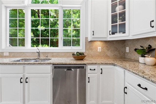 16400 Orchard Tavern Pl, Moseley, VA 23120 - kitchen with dishwasher, a sink, white cabinets, glass insert cabinets, and decorative backsplash