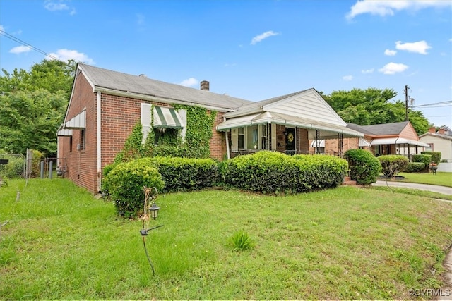 322 St Matthew St, Petersburg, VA 23803 - bungalow-style house with brick siding and a chimney