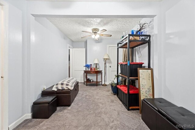322 St Matthew St, Petersburg, VA 23803 - sitting room featuring carpet floors, a ceiling fan, a textured ceiling, and baseboards