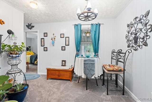 322 St Matthew St, Petersburg, VA 23803 - living area with a textured ceiling, a chandelier, carpet floors, baseboards, and crown molding